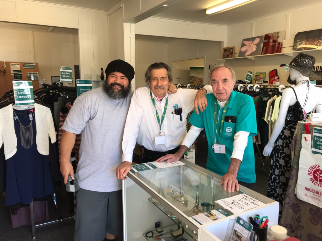 Paul (far right) invested hours of volunteer time into the Op Shop