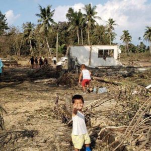 Tonga Response - Families survey the damage after the tsunami